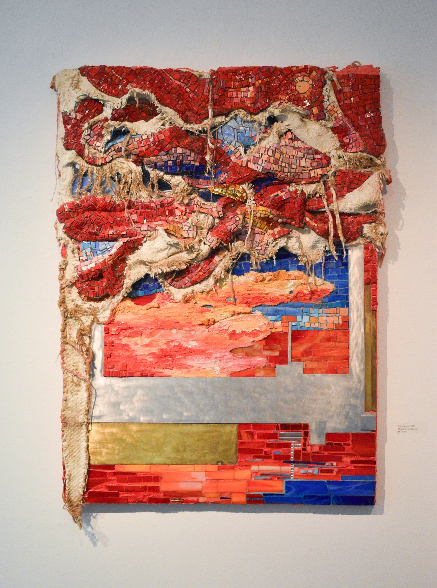 Red abstract mosaic artwork.